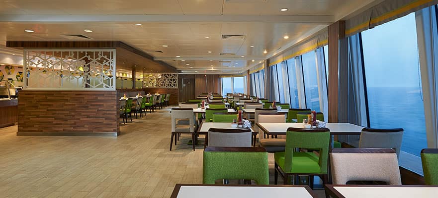 A restaurant with tables and chairs
Description automatically generated