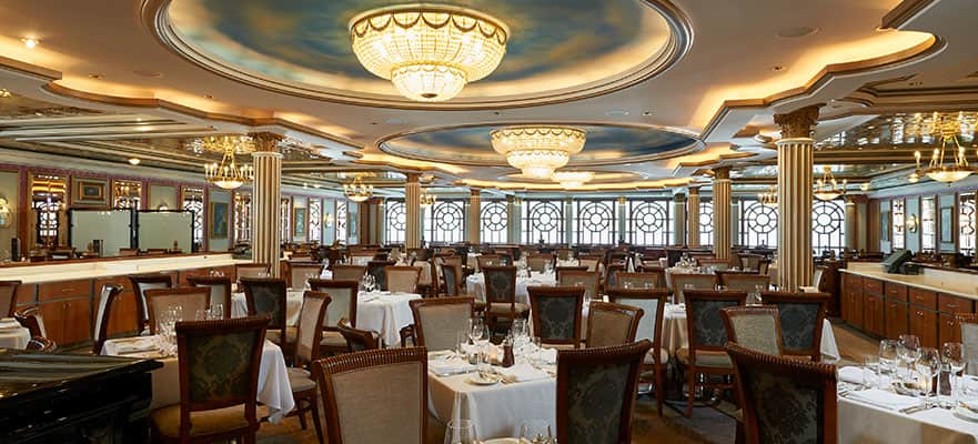 A restaurant with tables and chairs
Description automatically generated