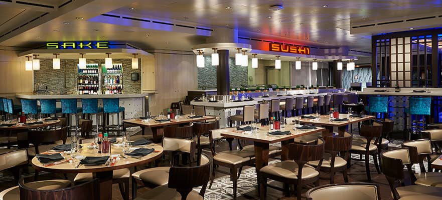 A restaurant with tables and chairs
Description automatically generated