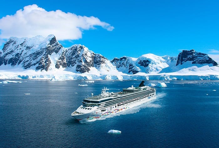A cruise ship in the water
Description automatically generated