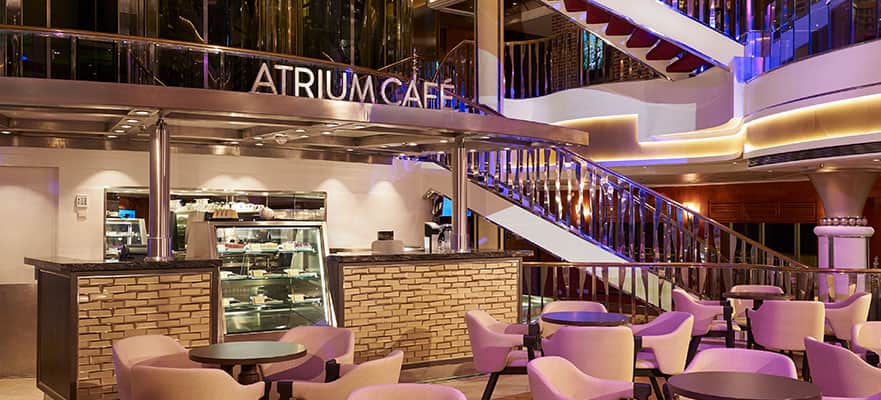 A restaurant with a staircase and stairs

Description automatically generated with medium confidence