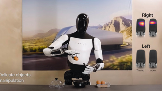 视频：特斯拉发布最强人形机器人Optimus二代，两指捏鸡蛋，速度快30%