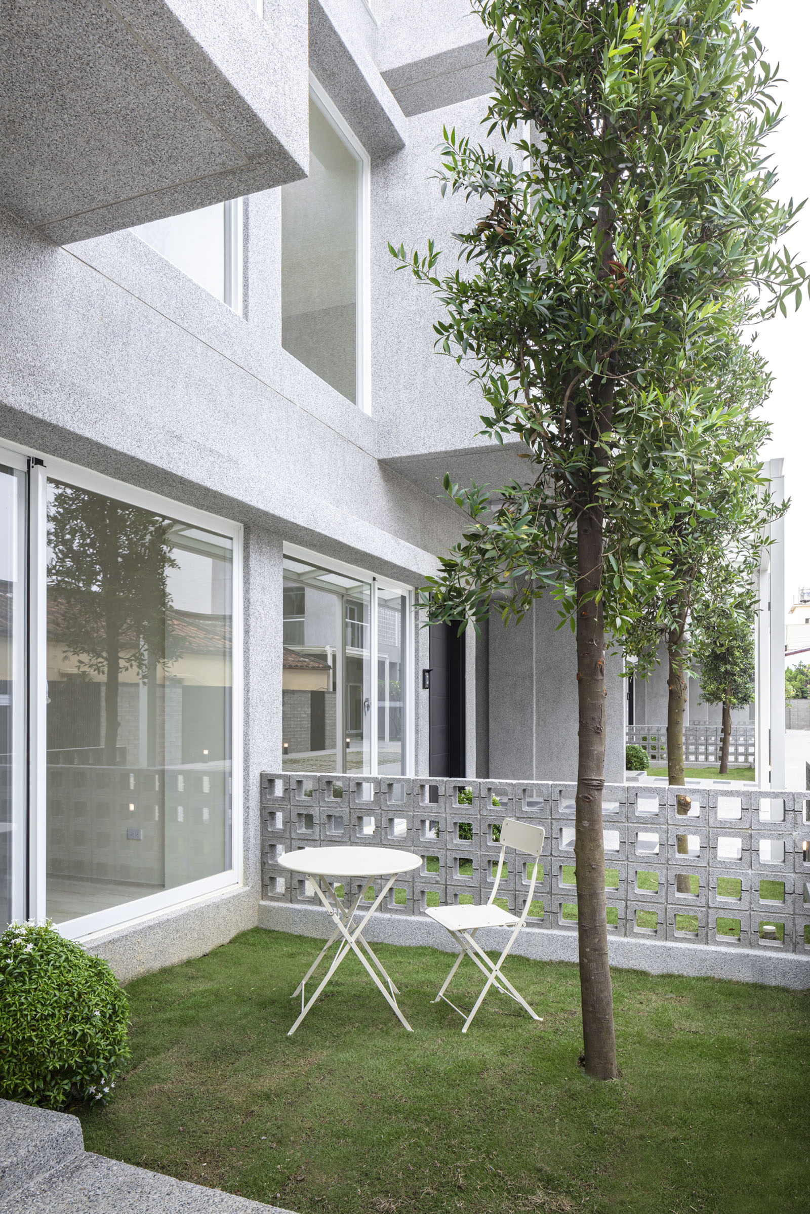 GREEN FRORNT YARD WITH ASIAN BAYBERRY TREES