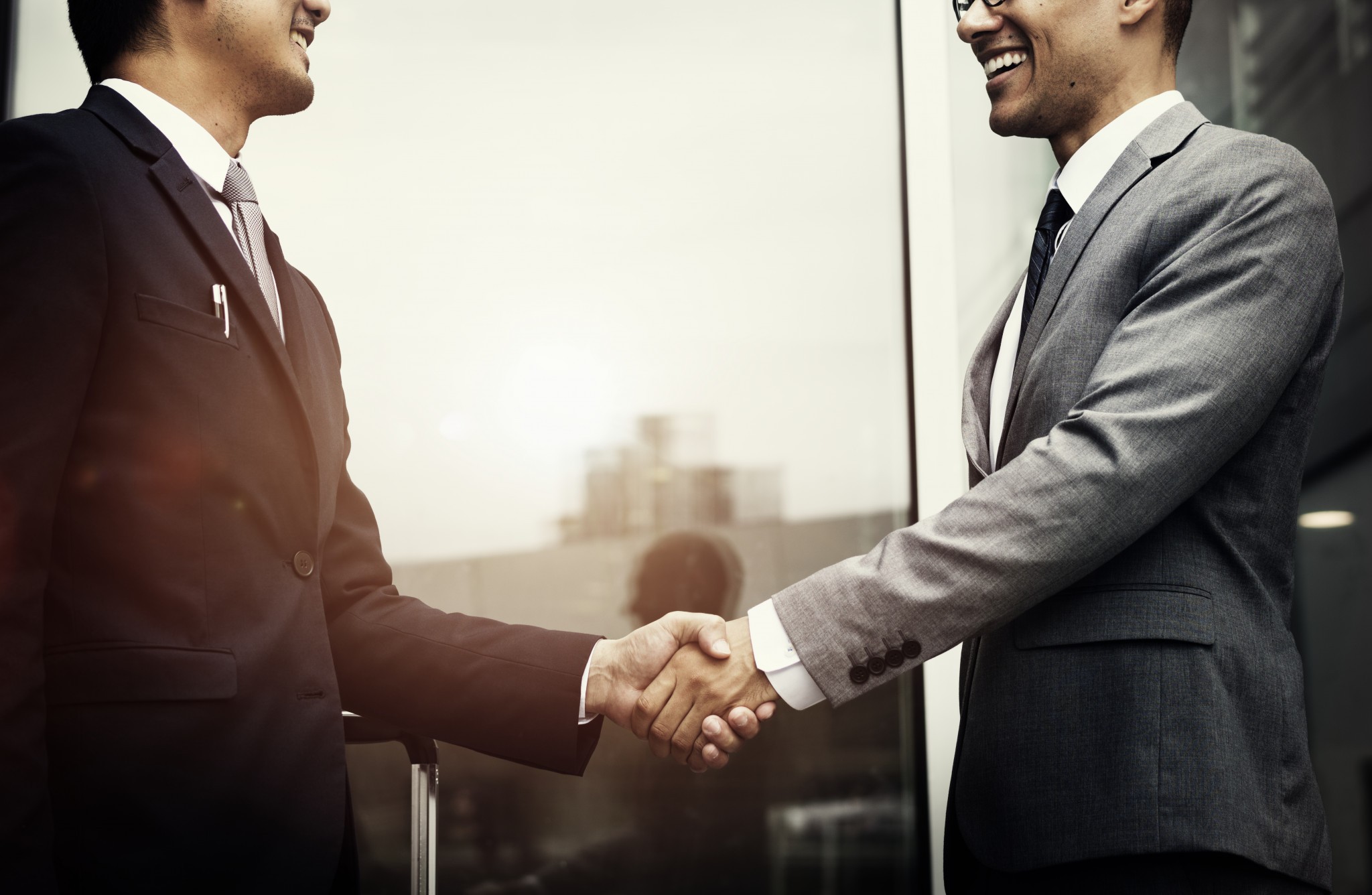 corporate-businessmen-shaking-hands